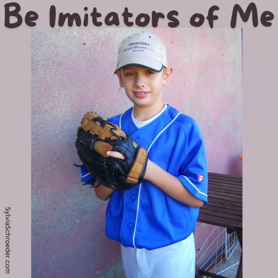 Boy dressed in baseball uniform