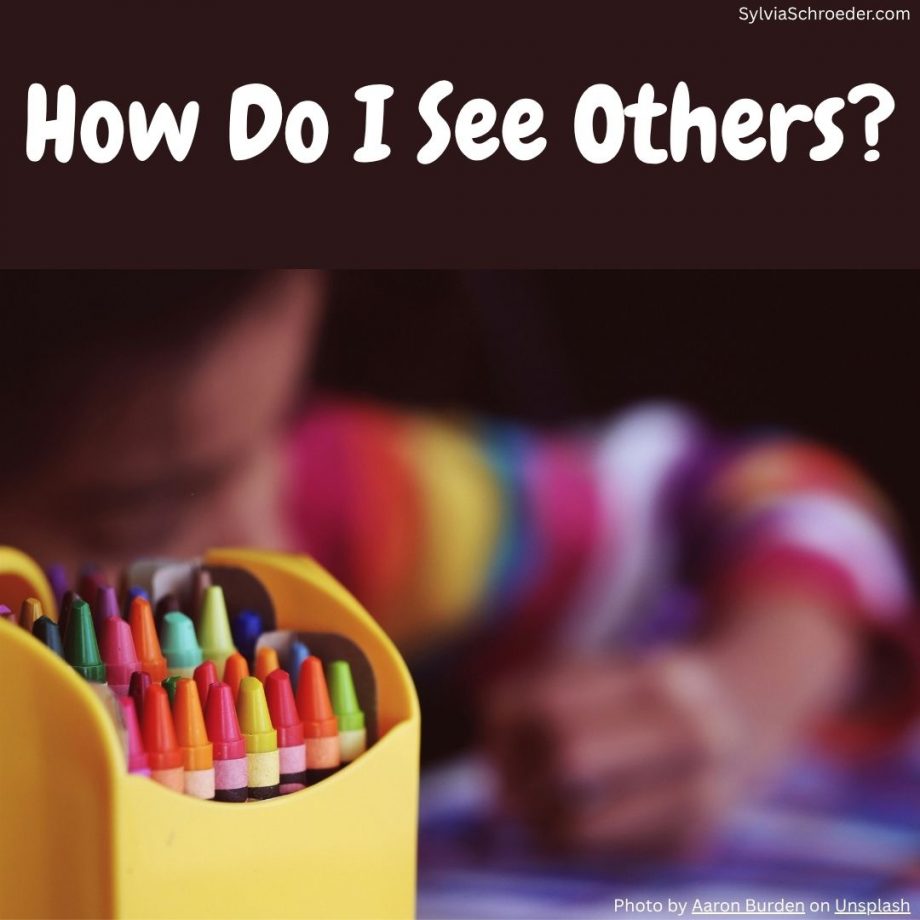 child coloring in a coloring book