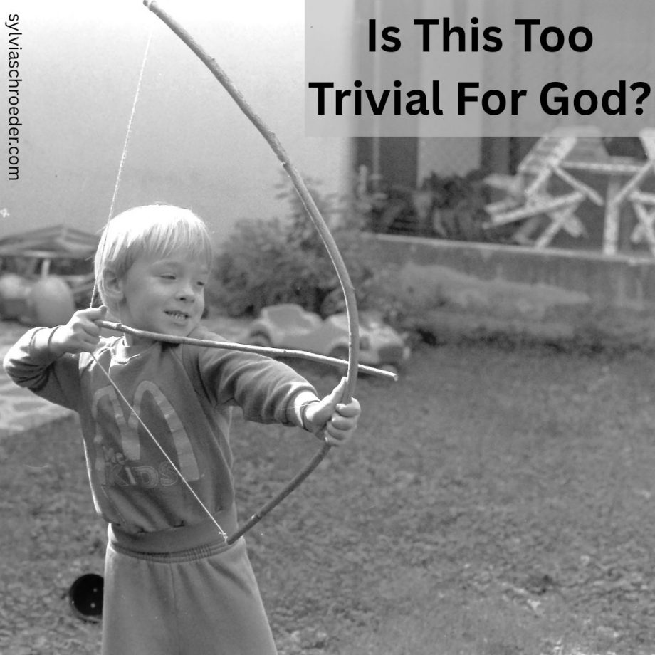 boy shooting a bow and arrow.