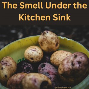 rotting potatoes under the sink