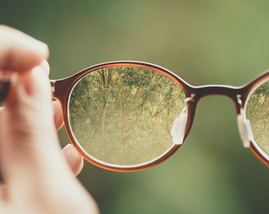 glasses helping see clearly a blurred world